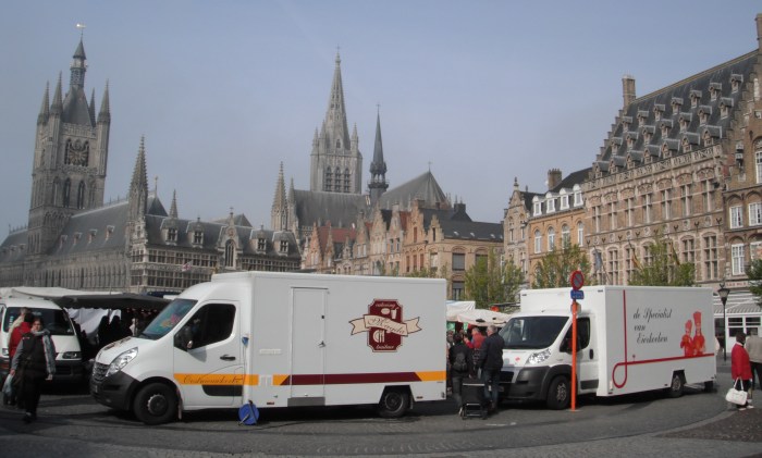 The Ypres Market, with the spires of the Cloth Museum (left) and Cathedral (right) in the distance