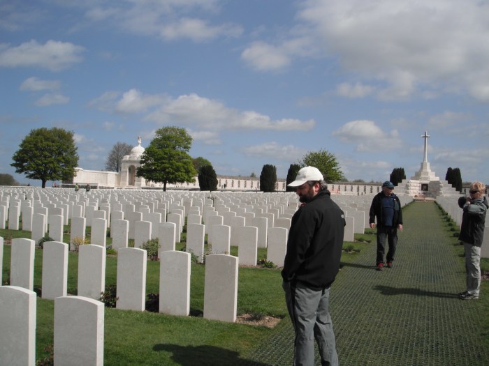 My parents and I looking through the headstones
