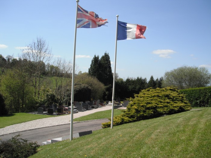 The commemorative plague outside of the Grangues church
