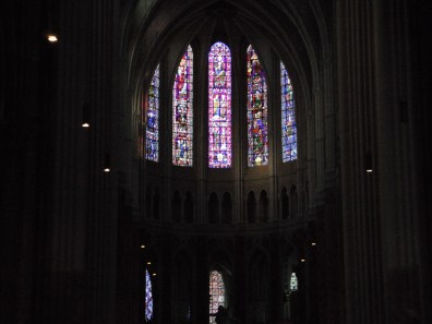 The stained-glass windows located at the nave